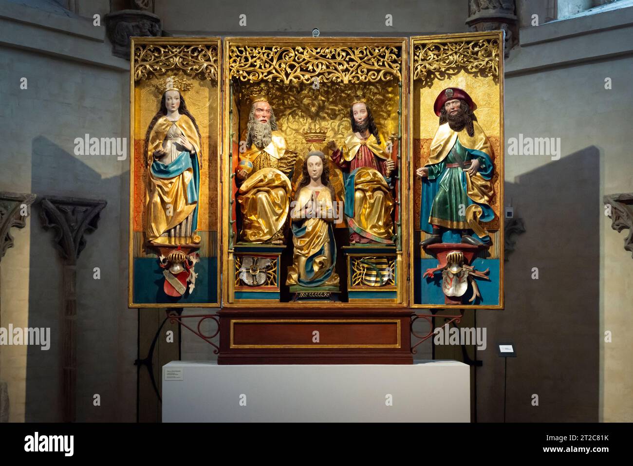 Tryptich of the Coronation of the Blessed Virgin Mary or altar triptych of Tenkitten Church, c. 1504 by unknown author in the Malbork Castle Museum, Malbork, Poland Stock Photo