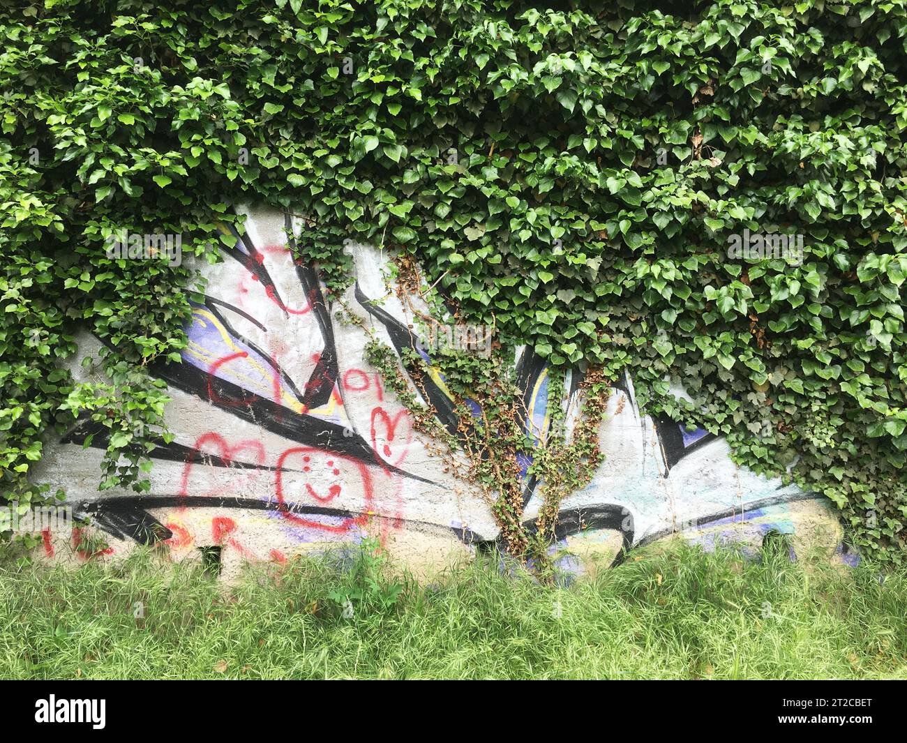 Street art of graffiti. Abstract color creative drawing fashion on walls of city. Urban