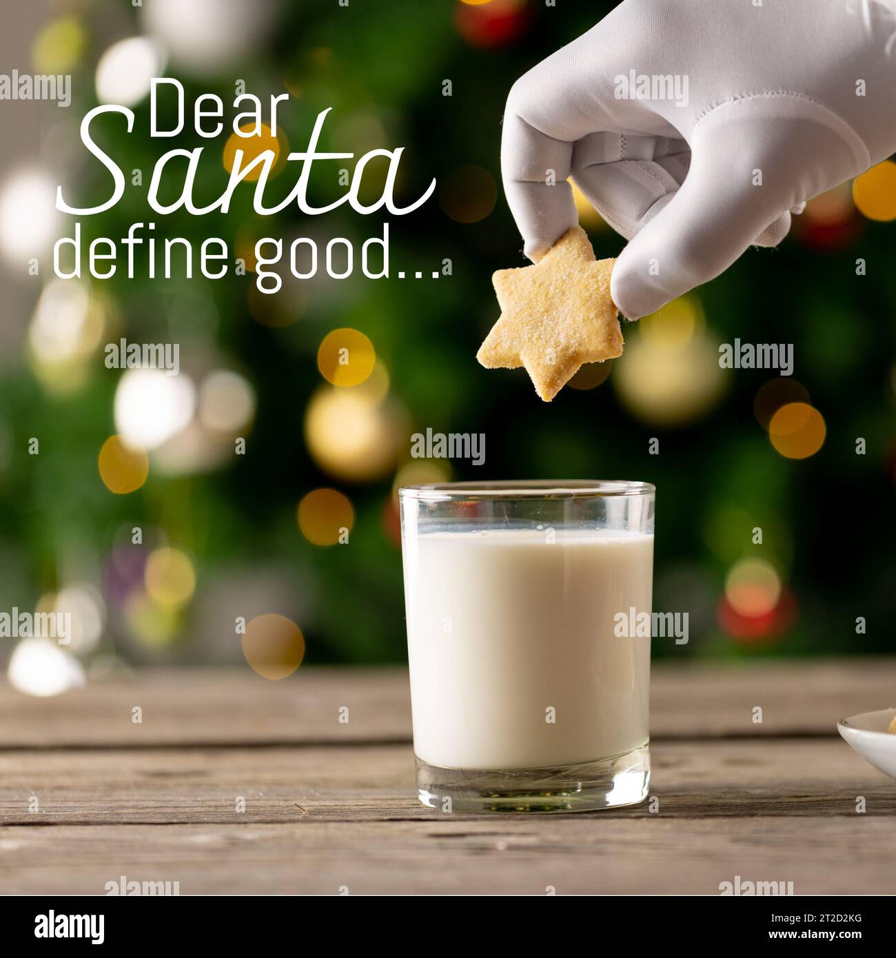 Composite of white hand dipping star shaped cookie in milk glass and dear santa define good text