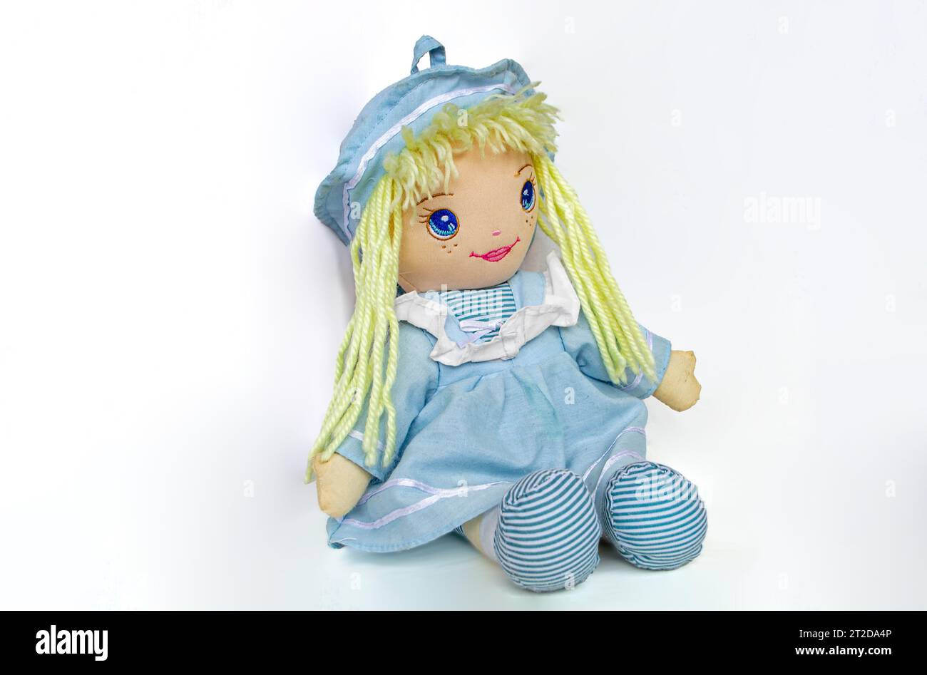 Handmade doll girl, made of fabric, painted with acrylic paints. High quality photo Stock Photo
