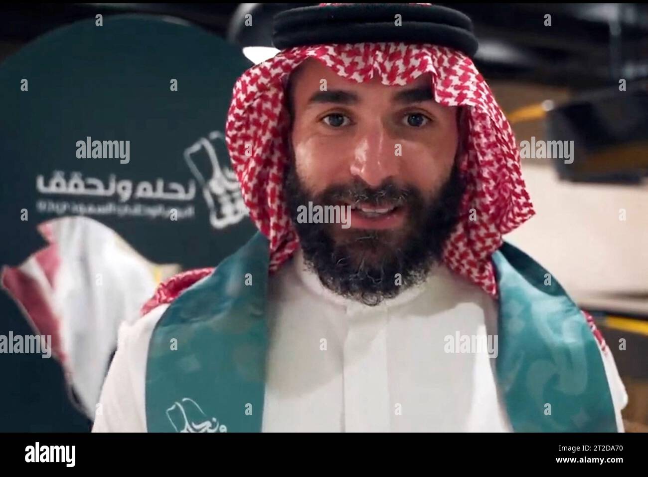 File photo - French football player Karim Benzema is seen dancing the traditional ‘aardha’, sometimes also known as the sword dance’, as he celebrates with his club ‘Al-Ittihad’, the Saudi National Day (September 23), in Jeddah, Kingdom of Saudi Arabia, on September 27, 2023. Benzema is wearing traditional Saudi clothes : a ghutra or keffieh on his head, a white dishdasha or thobe. 2022 Ballon d’Or winner Karim Benzema finds himself mired in political controversy amid the ongoing Israel-Hamas war. Speaking to French outlet CNews on Monday, French Interior Minister Gérald Darmanin accused Benze Stock Photo