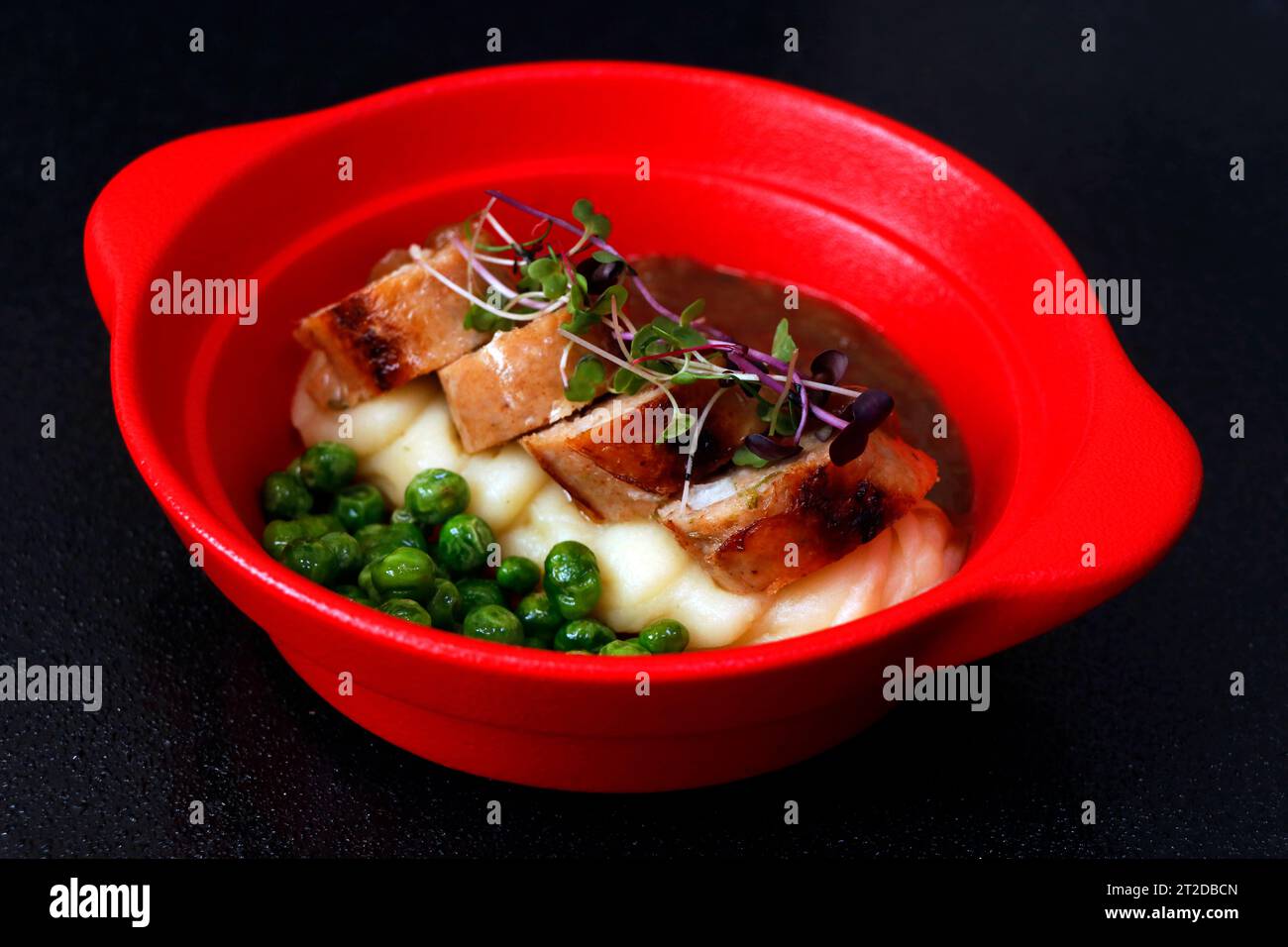 Bangers and mash, also known as sausages and mash, is a traditional