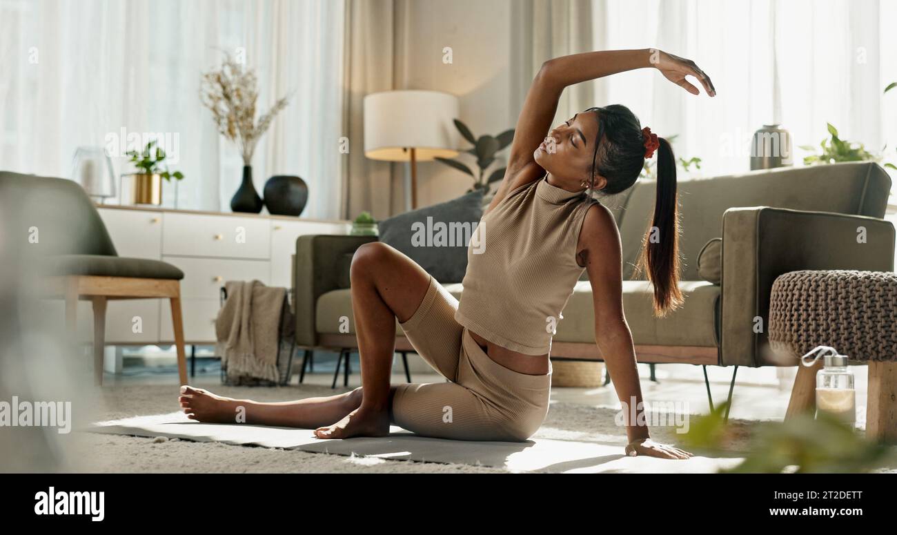 Woman, yoga and stretching on floor, peace or home for chakra