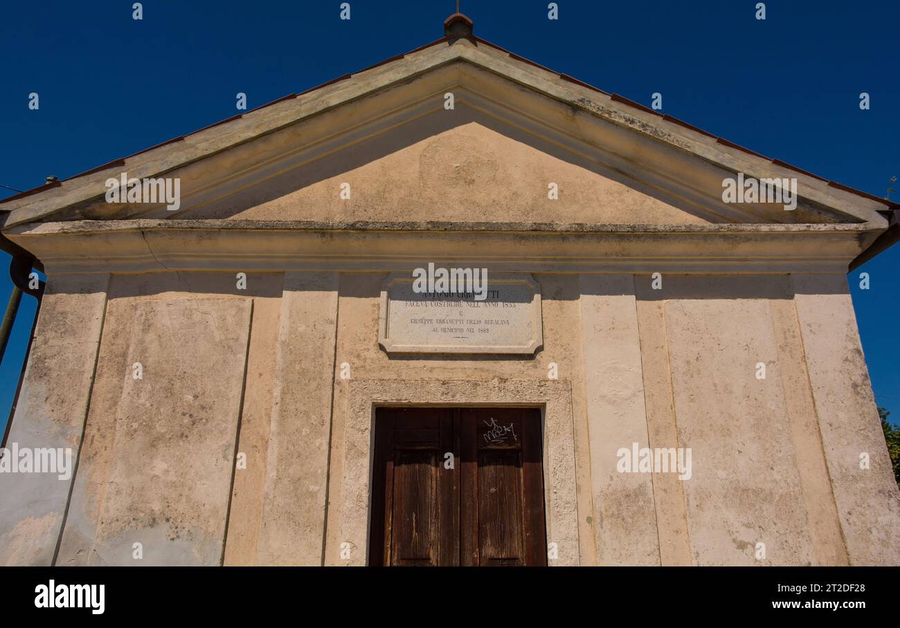 Aquileia, Italy - August 11th 2023. The small chapel of Cappelle delle Vergini Aquileiesi in Aquileia, Friuli-Venezia Giulia, north east Italy Stock Photo