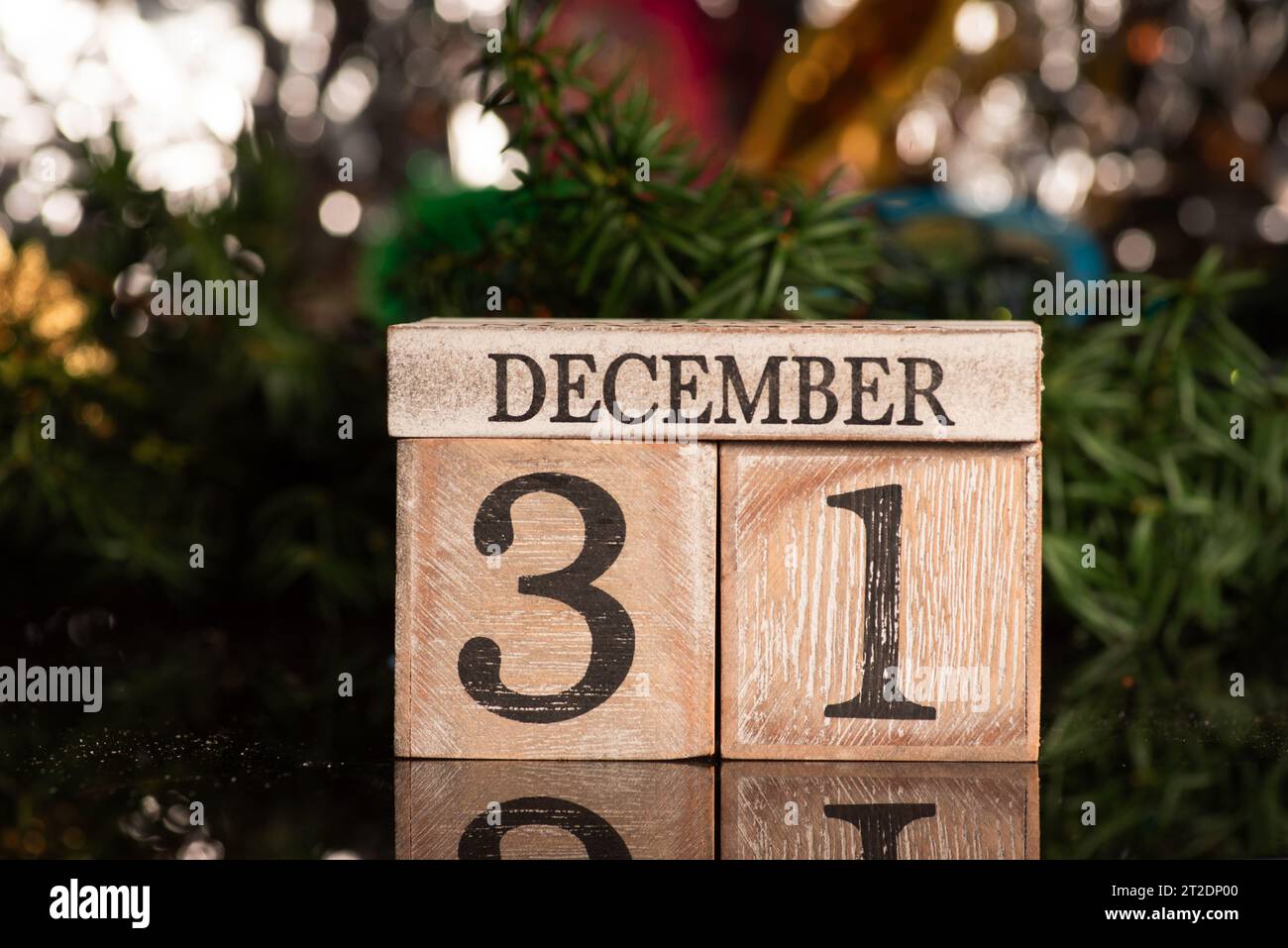 31st December sign for New Year's eve and Christmas tree winter holiday festive background and ornaments Stock Photo