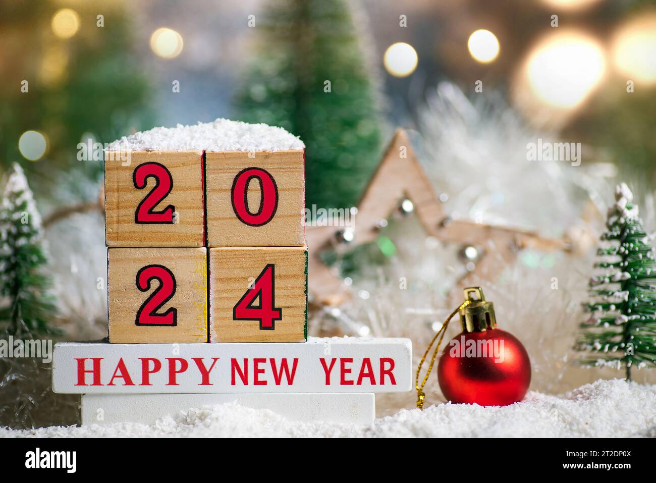Happy New Year 2024 with Christmas tree winter holiday festive background and ornaments Stock Photo