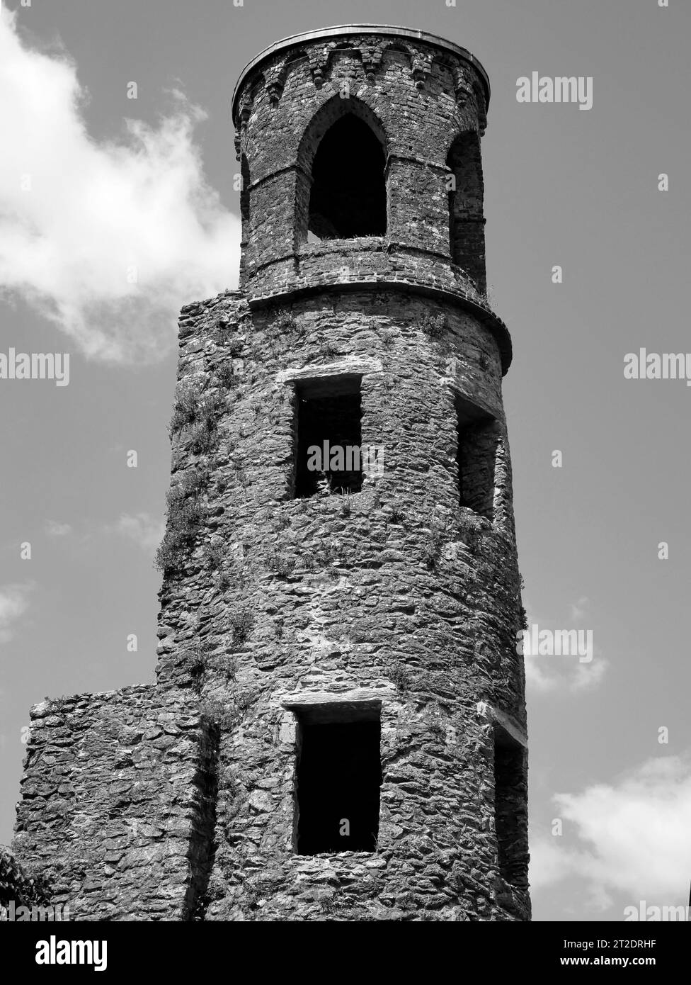 Old celtic castle tower over blue sky background, Blarney castle in ...