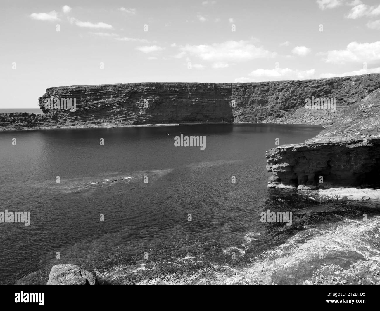 Cliffs and the Atlantic ocean background, rocks and laguna, beauty in