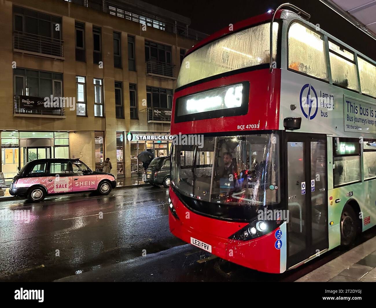 18 October 2023, Great Britain, London: A red double-decker bus drives through London. Photo: Benedikt von Imhoff/dpa Stock Photo