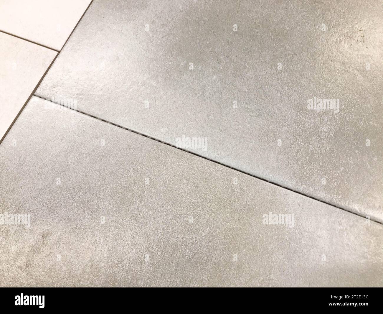 texture, floor and wall tiles. gray tiles with a concrete gap inside