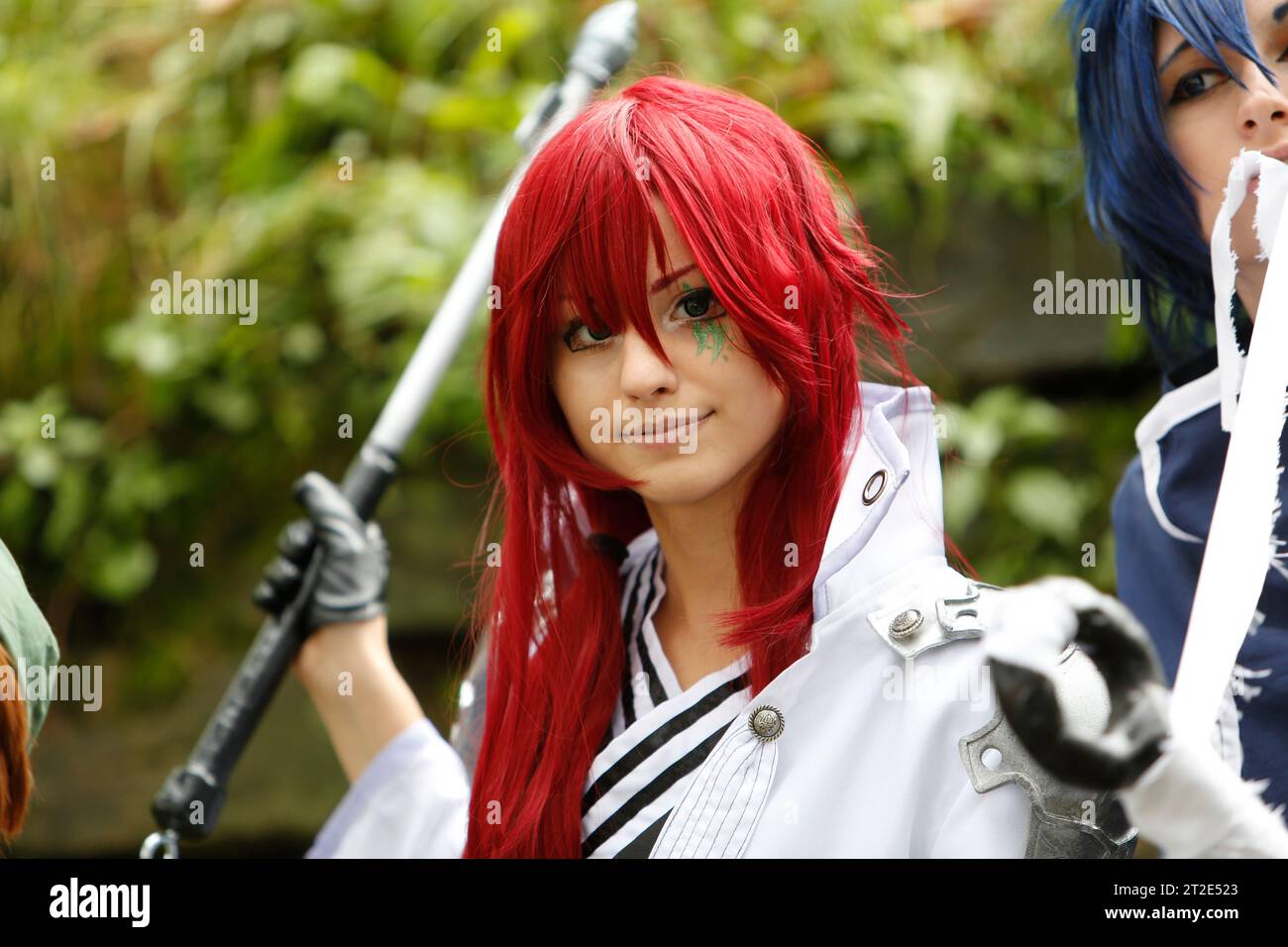 Lucca, Italy - 2018 10 31 : Lucca Comics free cosplay event around city girl with the red wig. High quality photo Stock Photo