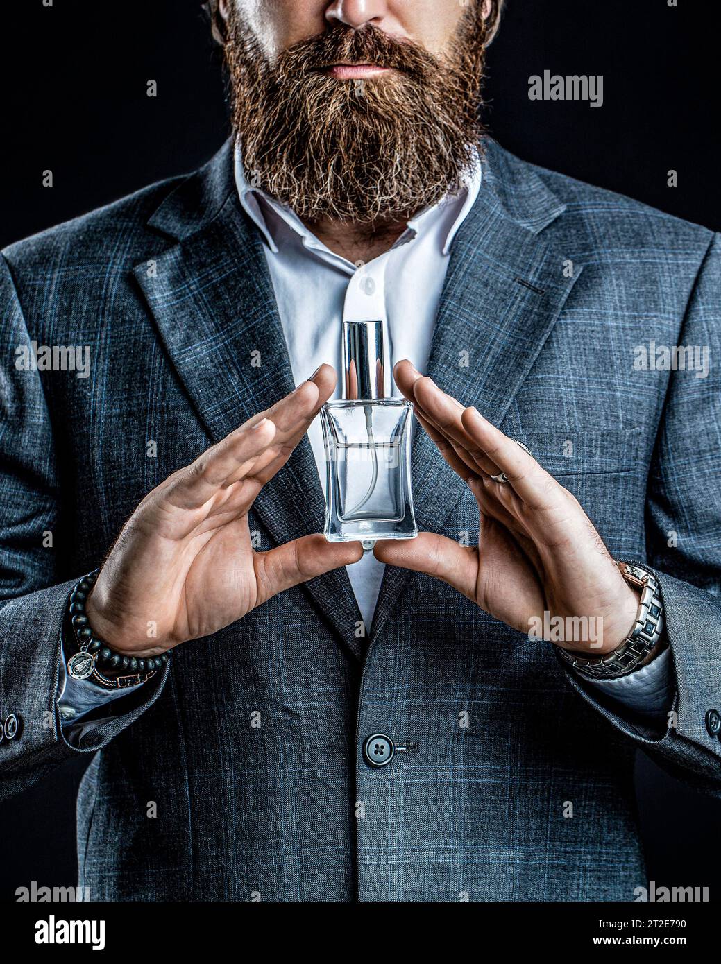 Young man holding bottle of perfume hi-res stock photography and images -  Page 3 - Alamy