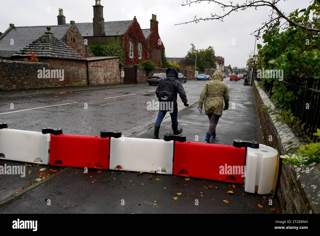 A flood defence barrier erected on Church street in the village of Edzell, Scotland. The UK is bracing for heavy wind and rain from Storm Babet, the second named storm of the season. A rare red weather warning stating there is a 'risk to life' has been issued for parts of Scotland as the storm is expected to batter the UK on Thursday. Picture date: Thursday October 19, 2023. Stock Photo