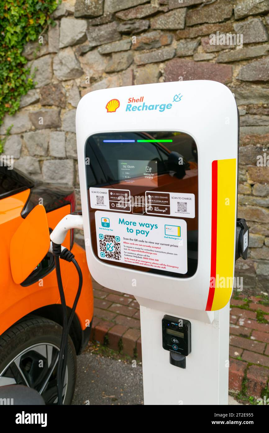 Shell Recharge electric car vehicle electrical charging point, Marlborough, Wiltshire, England, UK Stock Photo