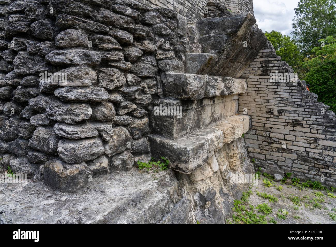 Detail of talud-tablero architectural style in the Mayan ruins of Yaxha-Nakun-Naranjo National Park, Peten, Guatemala.  Structure 1 of the Maler Group Stock Photo