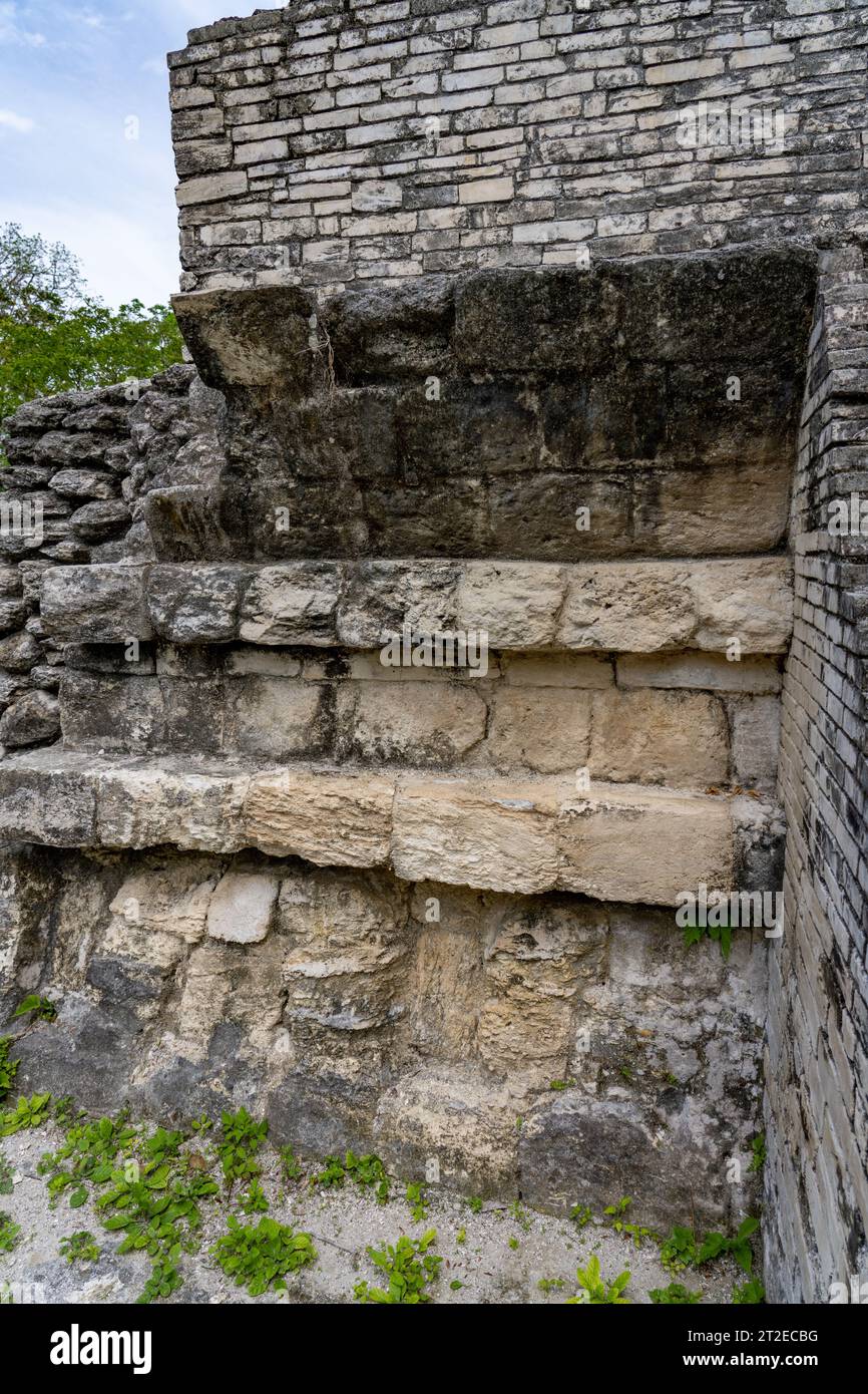 Detail of talud-tablero architectural style in the Mayan ruins of Yaxha-Nakun-Naranjo National Park, Peten, Guatemala.  Structure 1 of the Maler Group Stock Photo