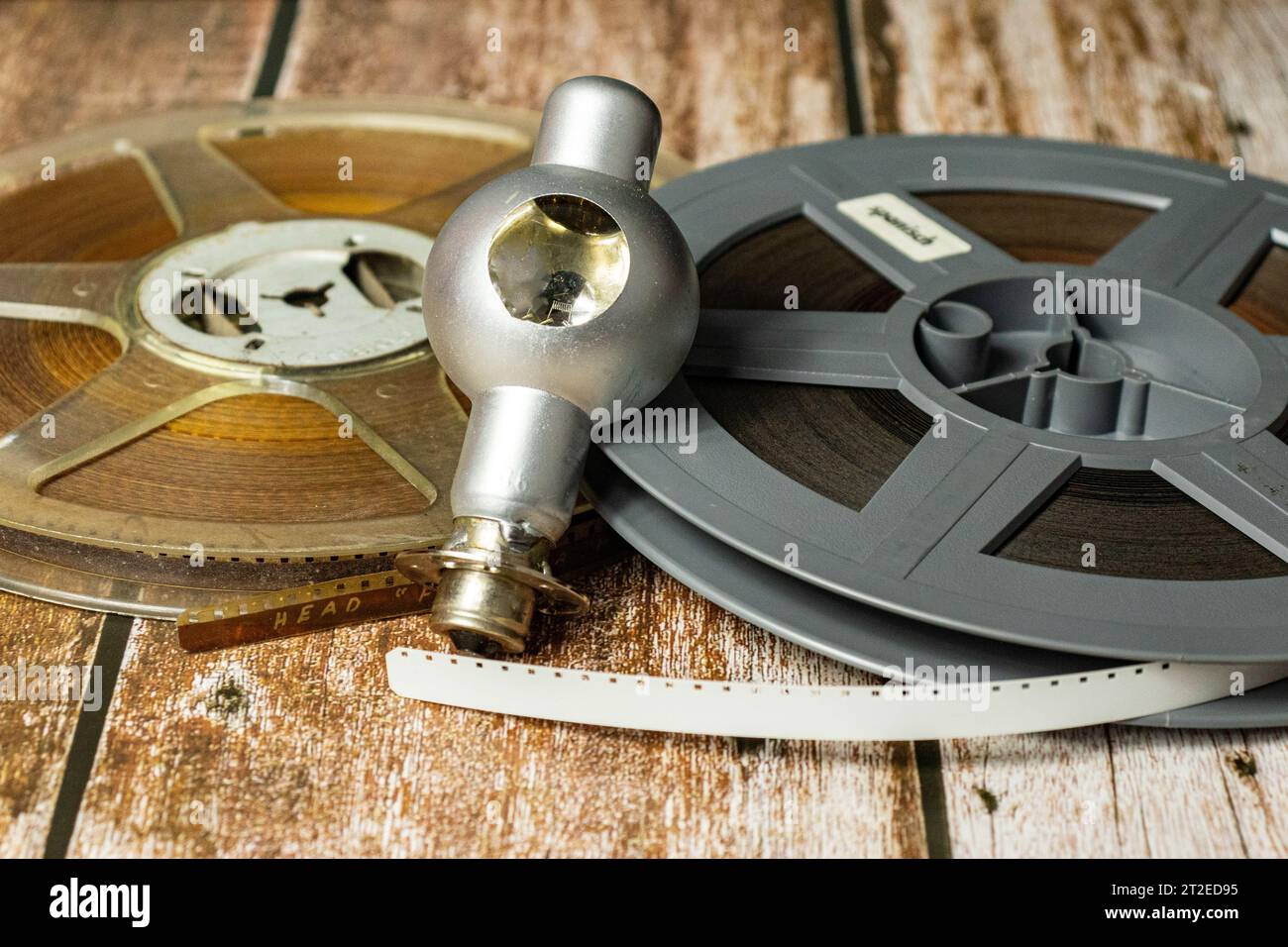 8mm projector lamp and two old film reels Stock Photo