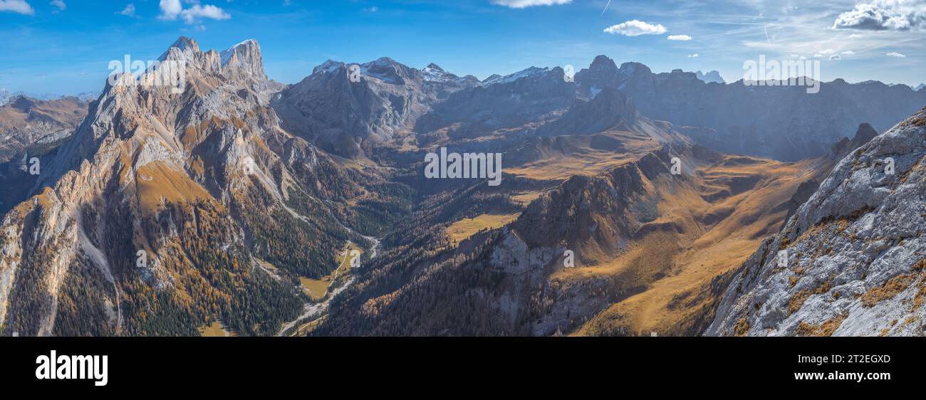 Panoramic view of the Marmolada massif in the Italian Dolomites. Summit view of the heart of the Italian Dolomites with autumnal foliage. Stock Photo