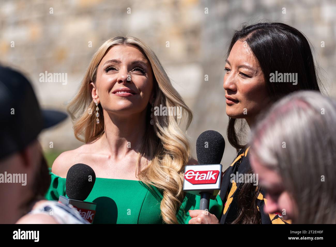 Danielle Graham & Lainey Lui reporting for etalk on CTV Television Network in Windsor, UK, covering the royal wedding of Prince Harry & Meghan Markle Stock Photo