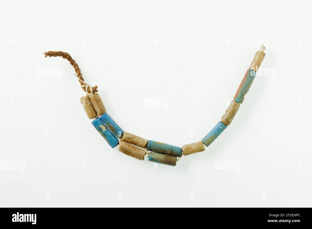 Bead anklet Middle Kingdom ca. 2060–2010 B.C. View more. Bead anklet. ca. 2060–2010 B.C.. Faience, linen thread. Middle Kingdom. From Egypt, Upper Egypt, Thebes, Deir el-Bahri, Temple of Mentuhotep II, North Triangular Court,, Pit 24, on ankle among bandages, MMA excavations, 1922–23. Dynasty 11 Stock Photo