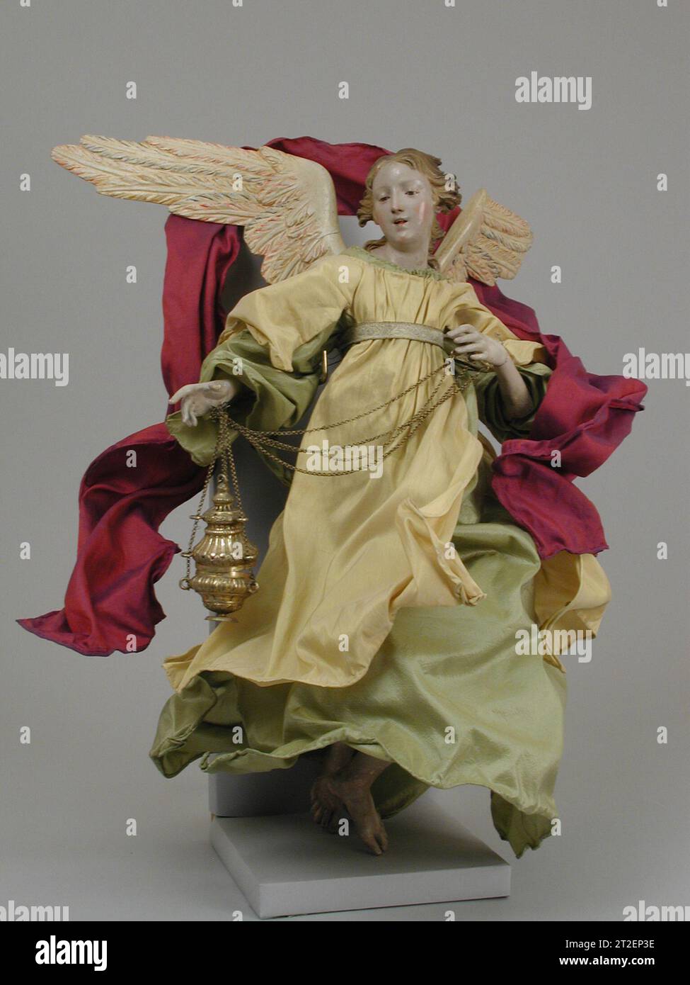 Angel Italian, Naples 18th–19th century View more. Angel. Italian, Naples. 18th–19th century. Polychromed terracotta head; wooden limbs and wings; straw and various fabrics; silver-gilt censer. Crèche Stock Photo