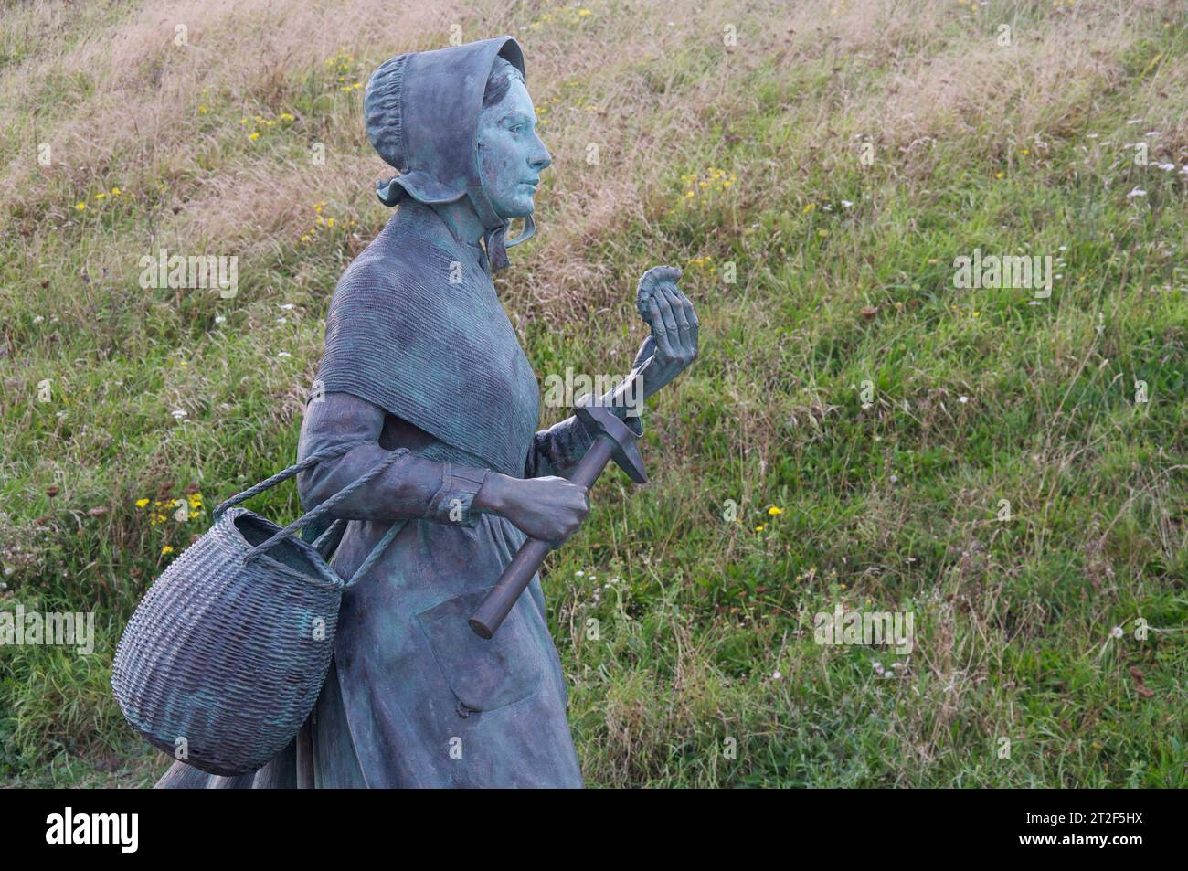 Bronze statue of the pioneering palaeontologist and fossil hunter Mary Anning 1799-1847. By sculptor Denise Dutton. Lyme Regis, Dorset, Jurassic Coast. Stock Photo
