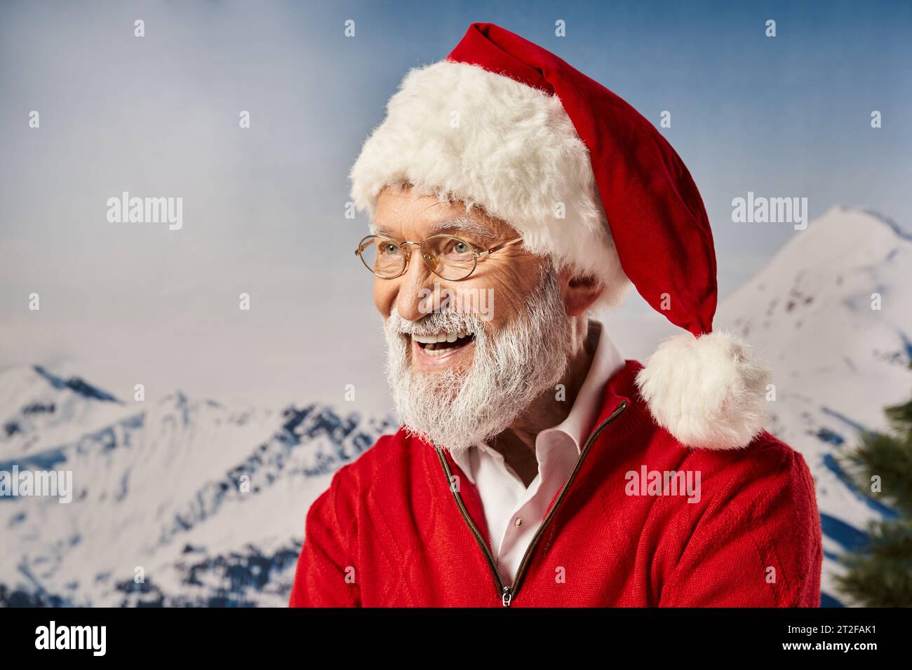 cheerful man in Santa red costume and glasses smiling happily with ...