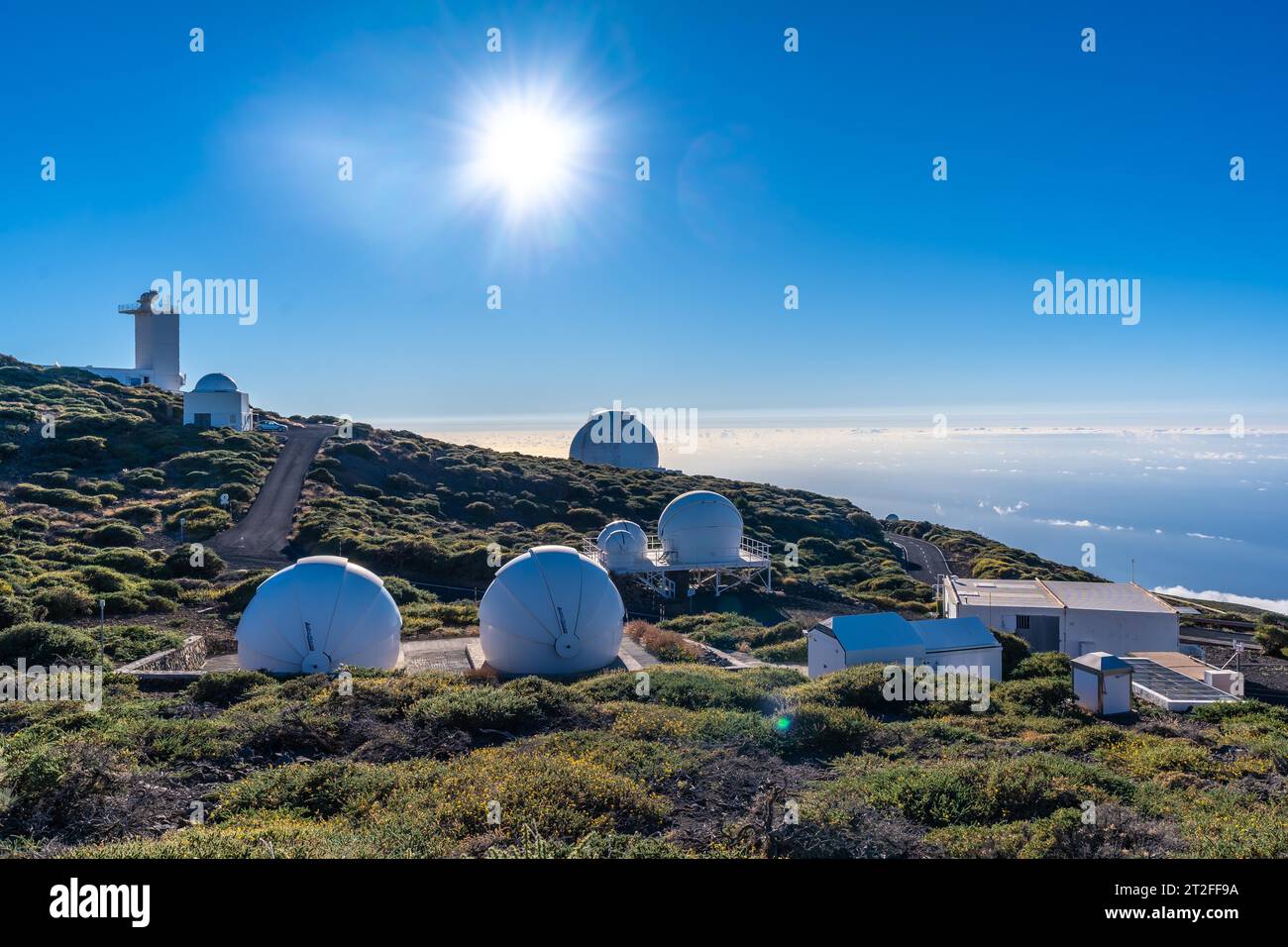 Observatories of the Roque de los Muchachos in the Caldera de Taburiente with a sea of nuts below one summer afternoon, La Palma, Canary Islands. Stock Photo