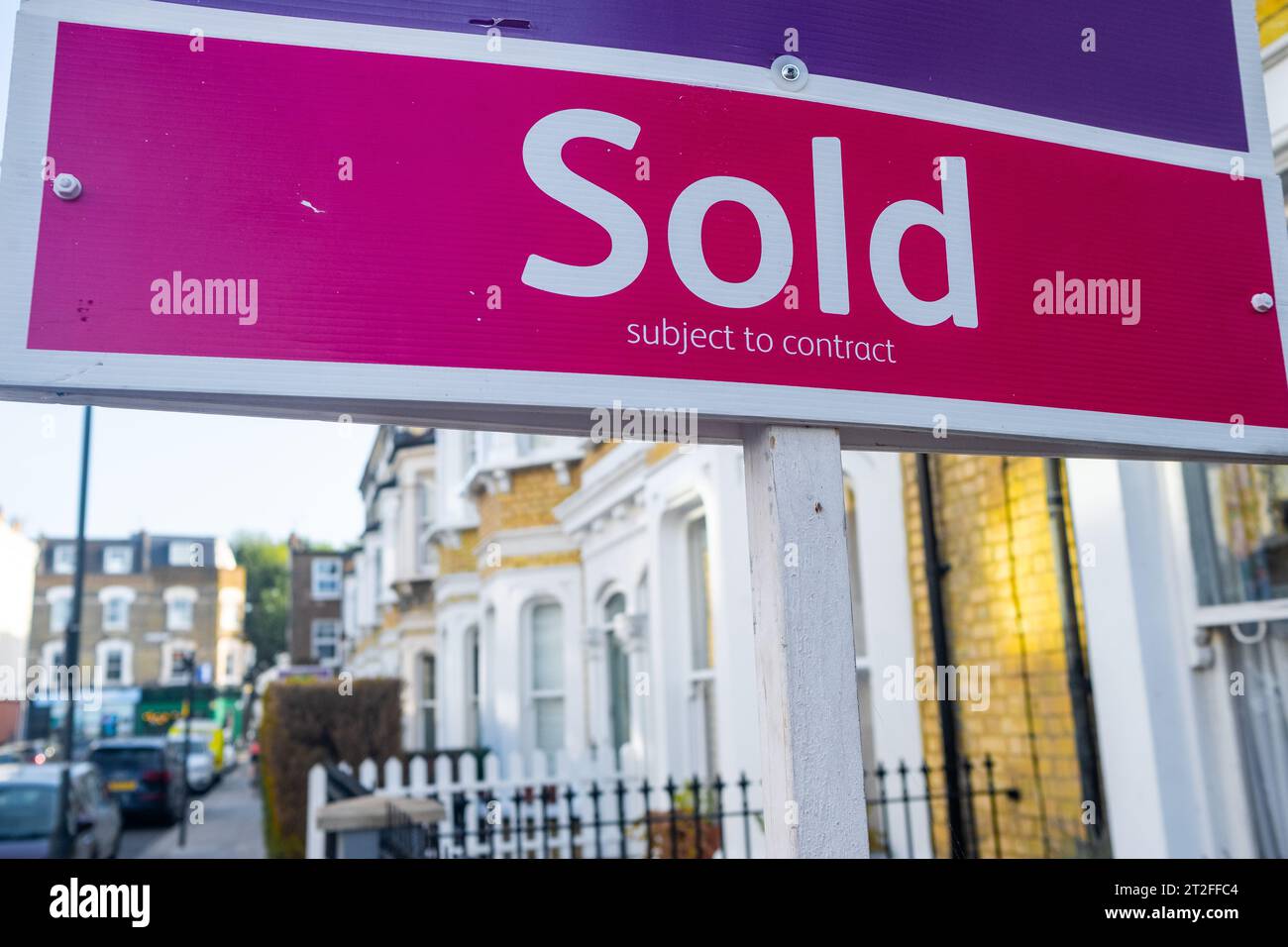 London- October 10, 2023: Estate agent Sold sign on residential street in SW6 area of Fulham, south west London Stock Photo