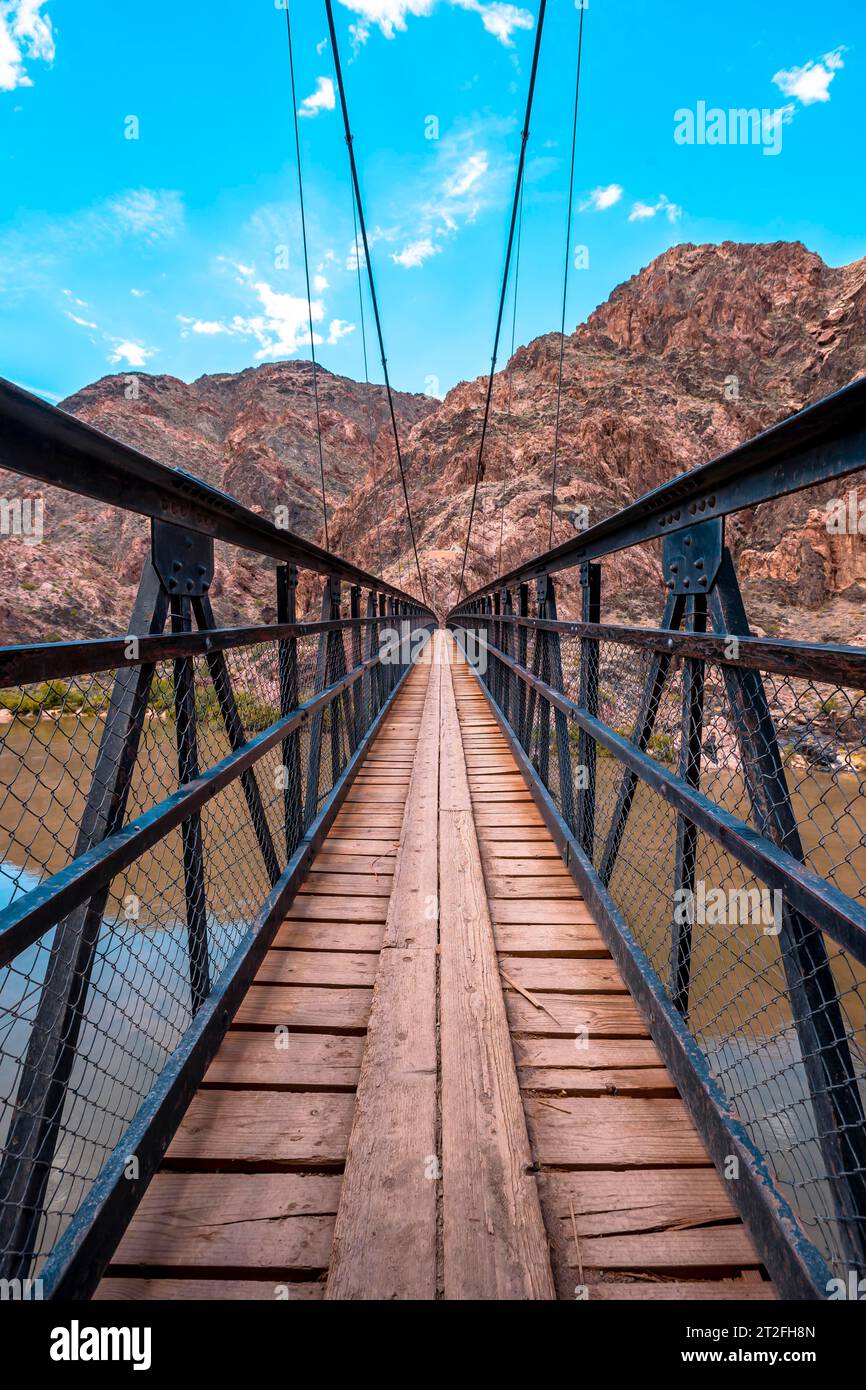 The beautiful bridge that crosses the Colorado River at the end of the South Kaibab Trailhead trek. Grand canyon Stock Photo