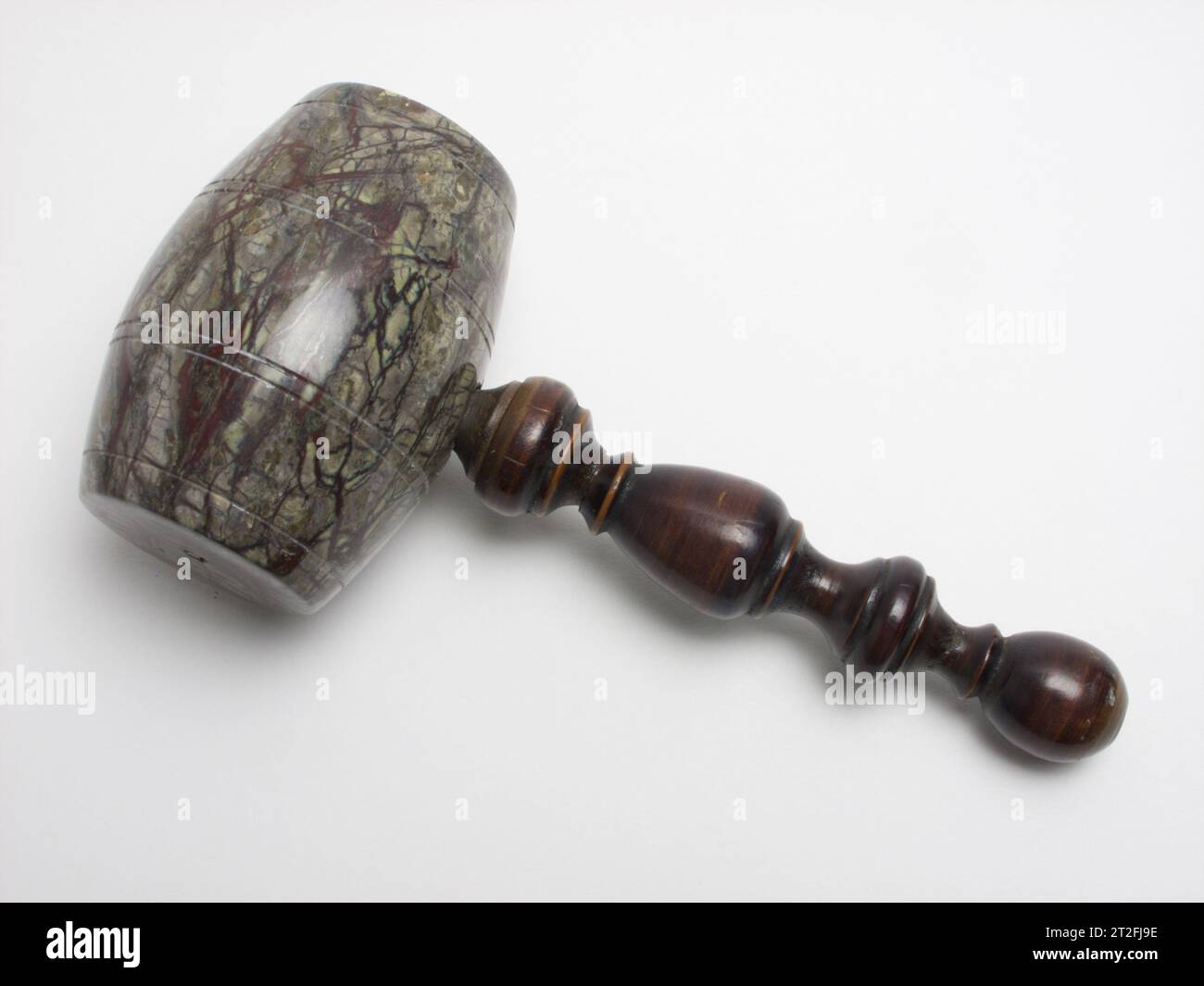 antique Cornish serpentine stone gavel with turned wooden handle. The beautifully polished gavel