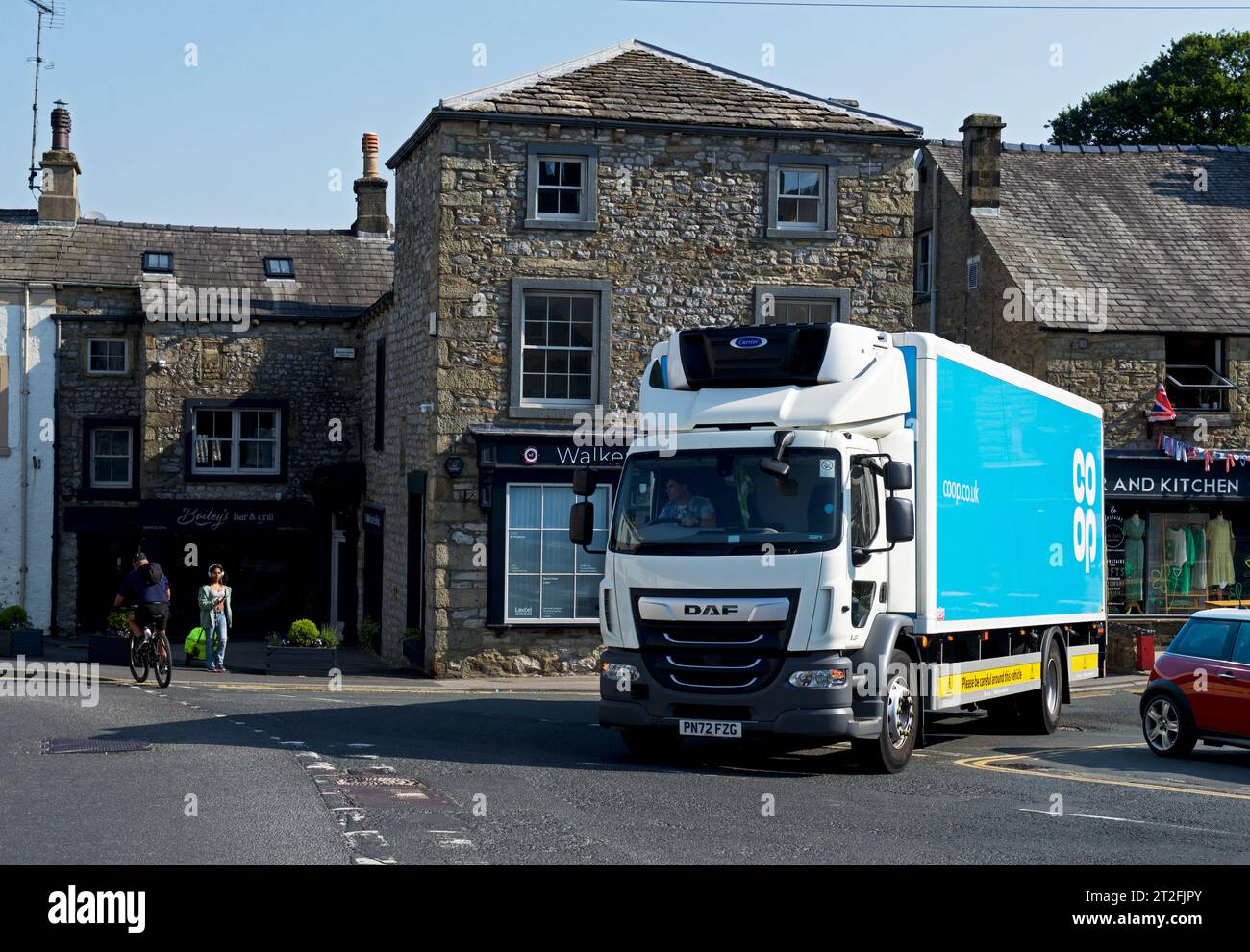 Coop lorry delivering to Coop store in Settle, North Yorkshire, England UK Stock Photo