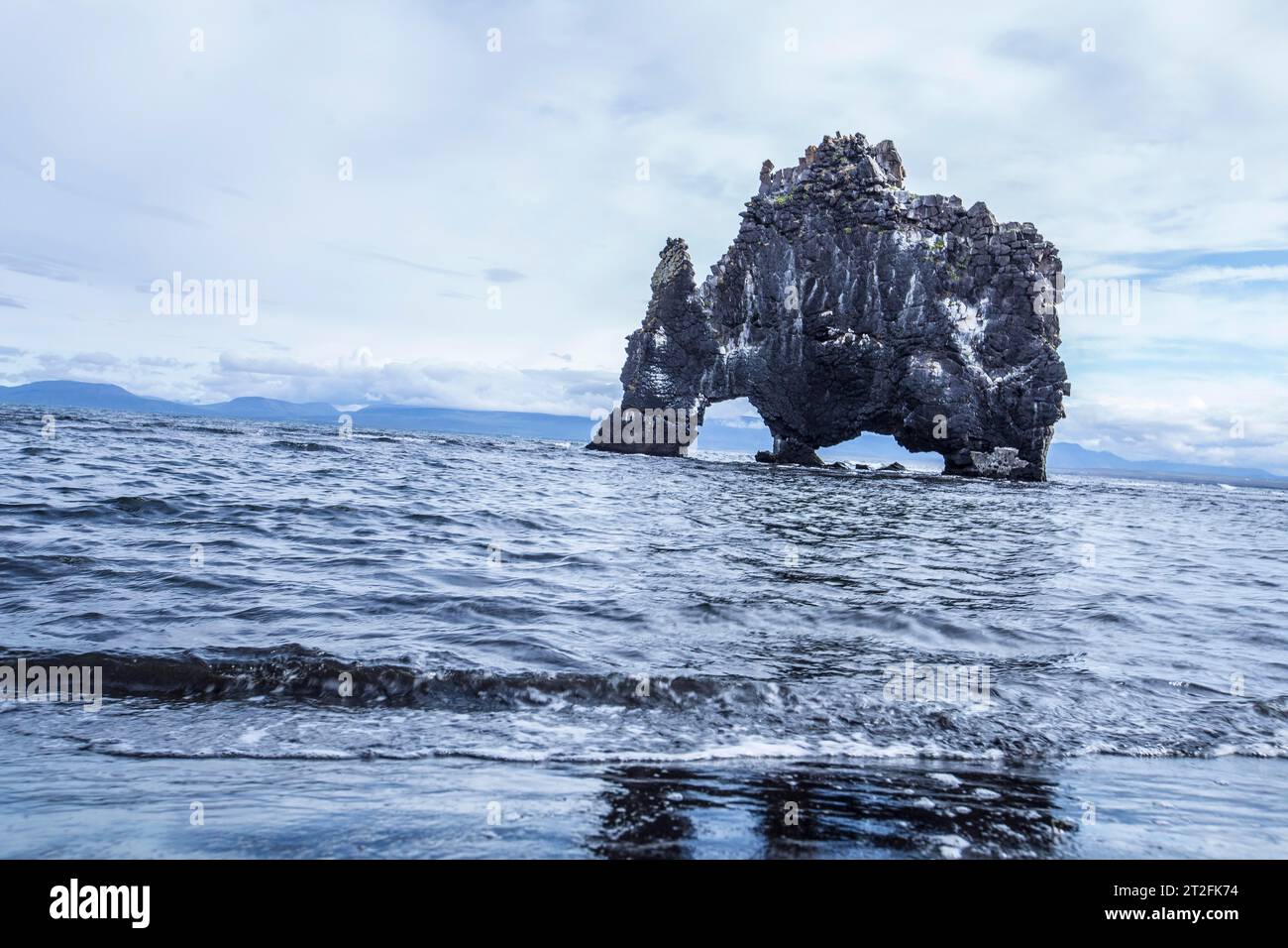 Stone dinosaur in the sea at Hvitserkur, Iceland Stock Photo