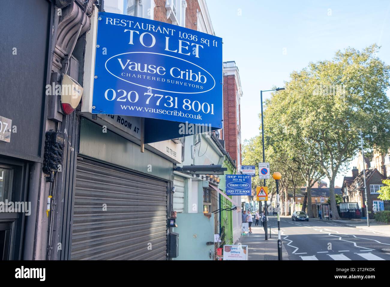 London- October 10, 2023: Commercial property estate agent sign advertising a Shop To Let Stock Photo