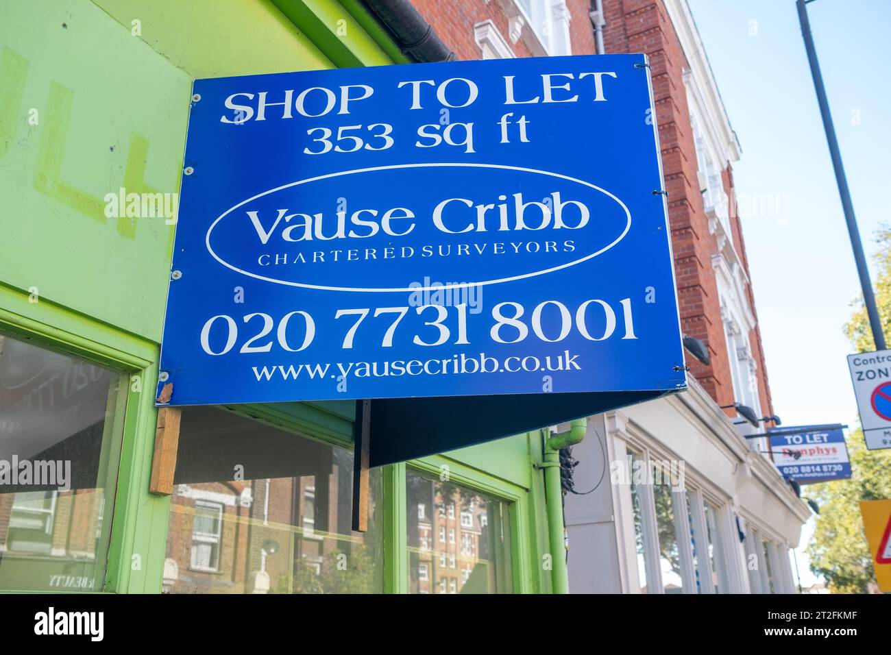 London- October 10, 2023: Commercial property estate agent sign advertising a Shop To Let Stock Photo