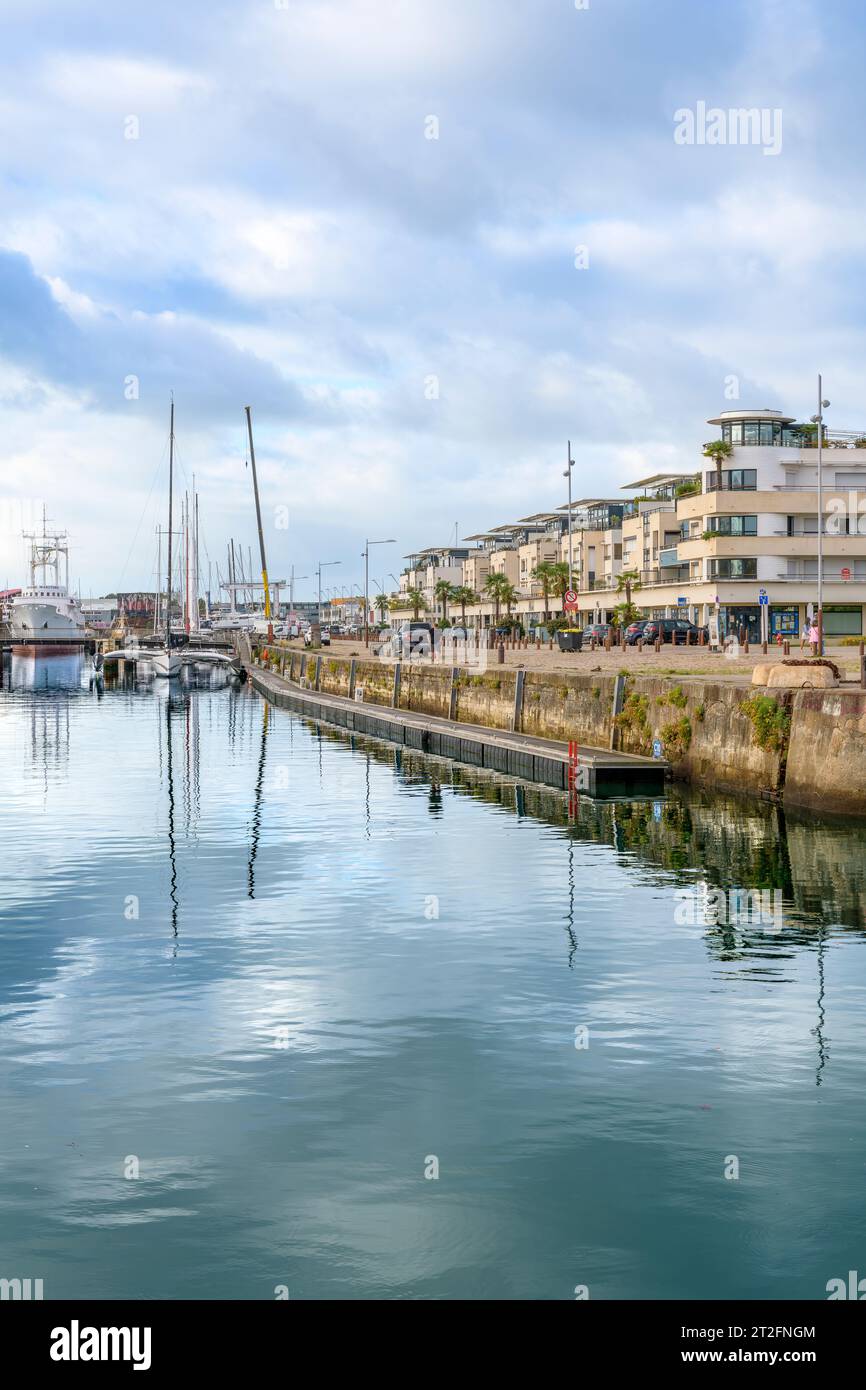 Modern apartments overlooking the marina with yachts and boats at the beautiful seaside town of La Rochelle on the west coast of France. Stock Photo