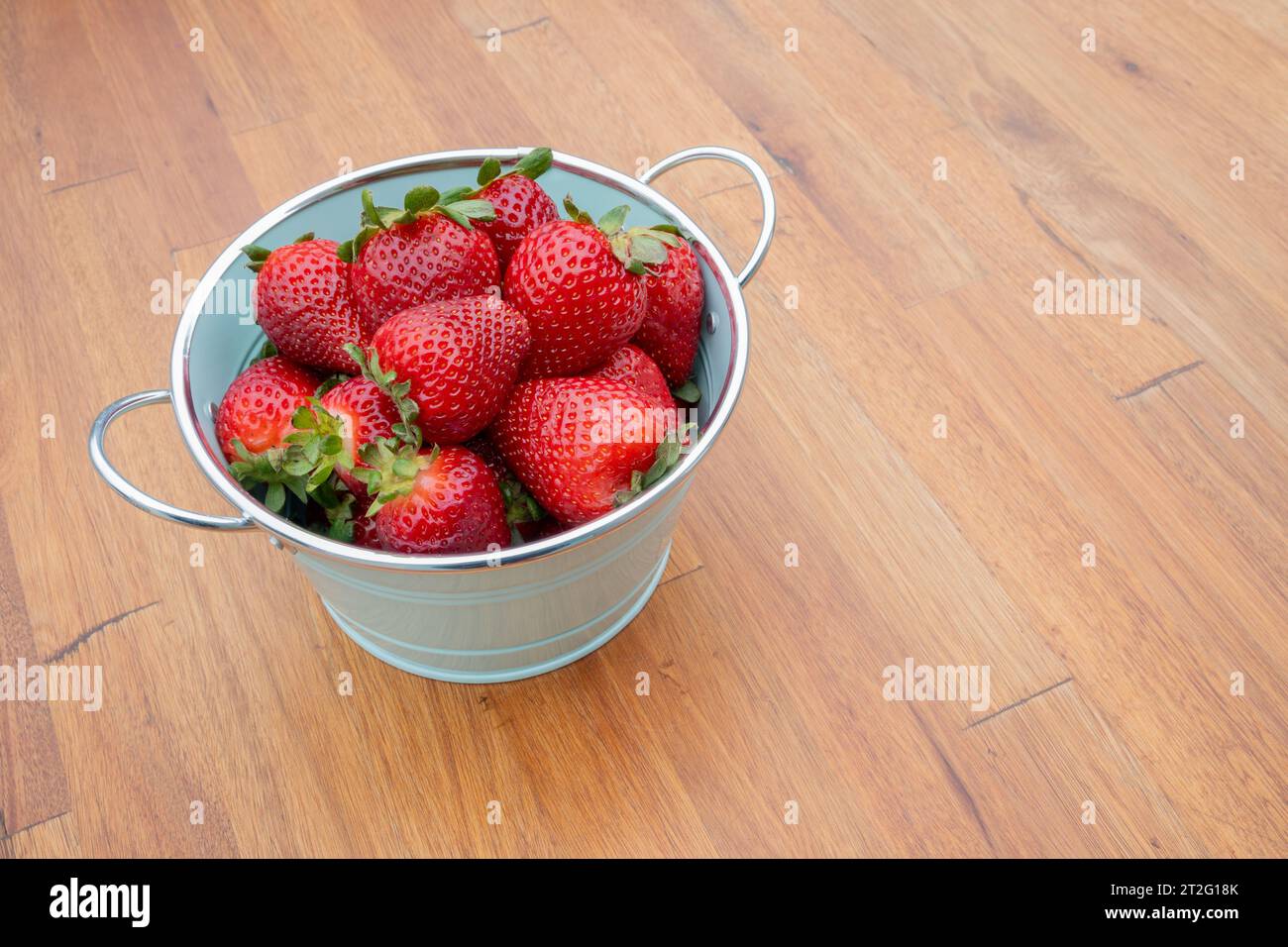 Fresh organic strawberries just picked from the garden in within a ...