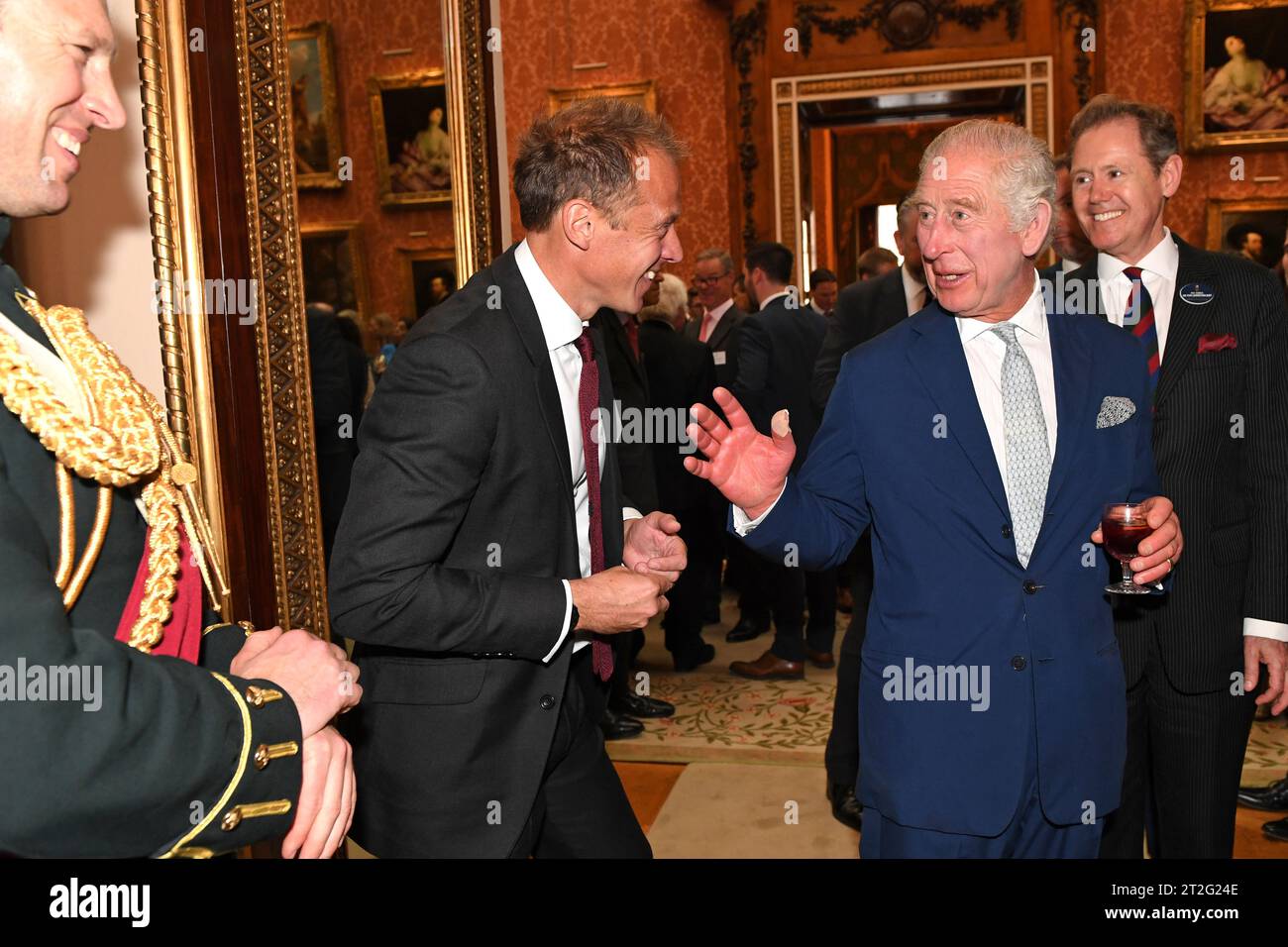 King Charles III meets Royal Photographer Chris Jackson during a