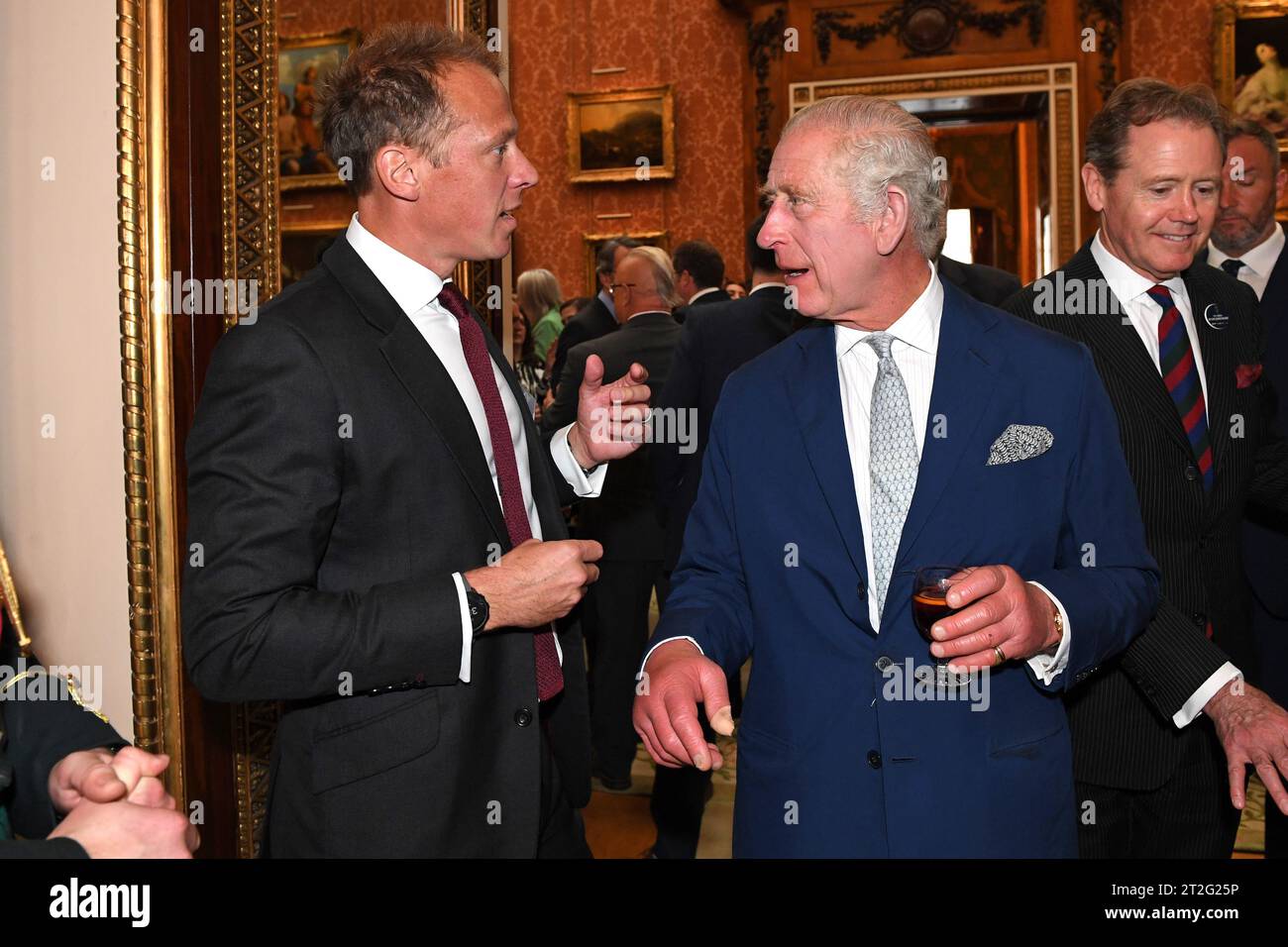 King Charles III meets Royal Photographer Chris Jackson during a
