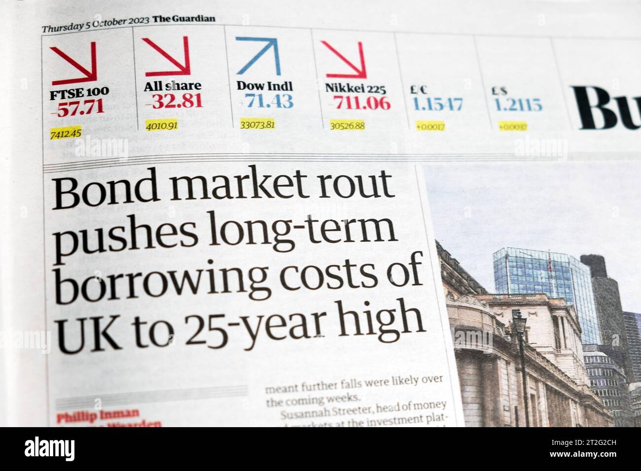 'Bond market rout pushes long-term borrowing costs of UK to 25 year high' Guardian newspaper headline Business section article 5 October 2023 London Stock Photo