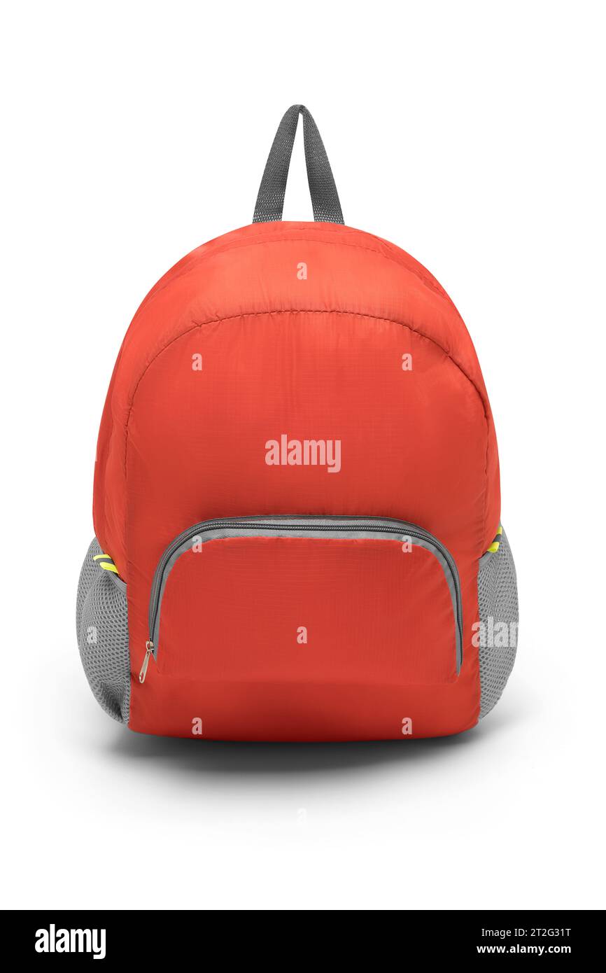 blank red backpack with zipper and shoulder straps isolated on white background. travel day pack rucksack. folding nylon school backpack. front view. Stock Photo