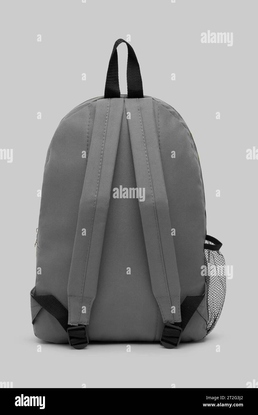 blank green backpack with zipper and shoulder straps isolated on white