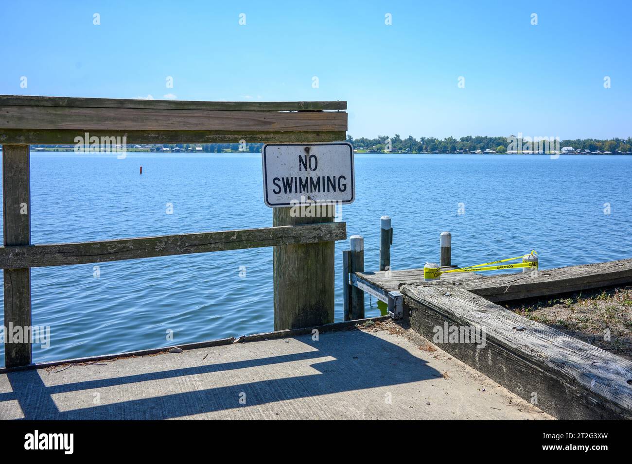 NEW ROADS, LA, USA SEPTEMBER 19, 2023 No Swimming sign on a dock