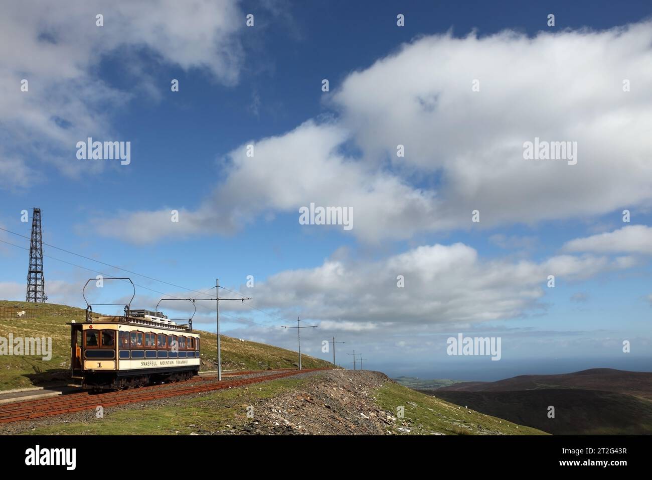 Snaefell Mountain Railway tram number 1 (1895) approaching Snaefell station, Isle of Man. Stock Photo