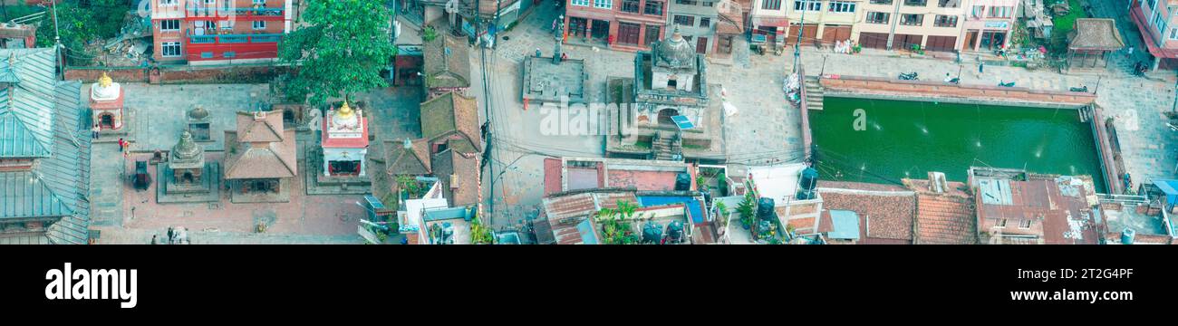 Aerial view of  Bagh Bhairab Temple, Kirtipur, hills, Kathmandu, palaces and buildings. Terraces and homes, city streets. Nepal. 10-13-2023 Stock Photo