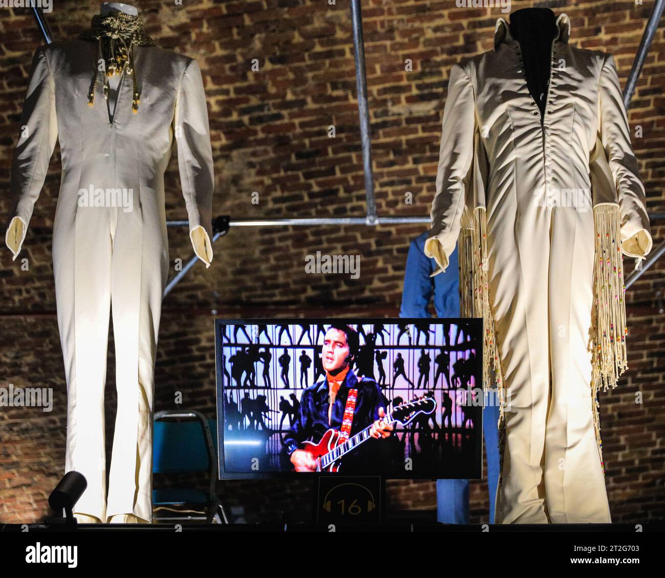 London, UK. 19th Oct, 2023. Two of Elvis's iconic, cream coloured jumpsuits on display. The 'Direct from Graceland: Elvis' exhibition features over 400 artefacts and iconic belongings owned by Elvis, direct from the icon's Graceland home in Memphis, Tennessee. The exhibition opens on Oct 20 at the Arches London Bridge venue in Bermondsey Street. Credit: Imageplotter/Alamy Live News Stock Photo