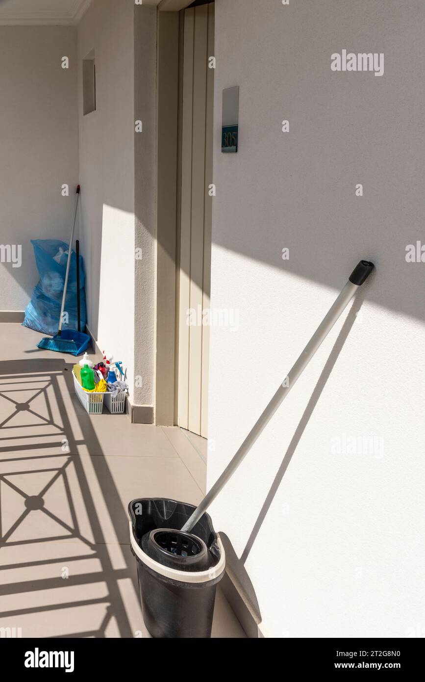 Greece, Europe.  01.10.2023.  Housekeeping equipment for cleaning hotel room placed outside bedroom door Stock Photo