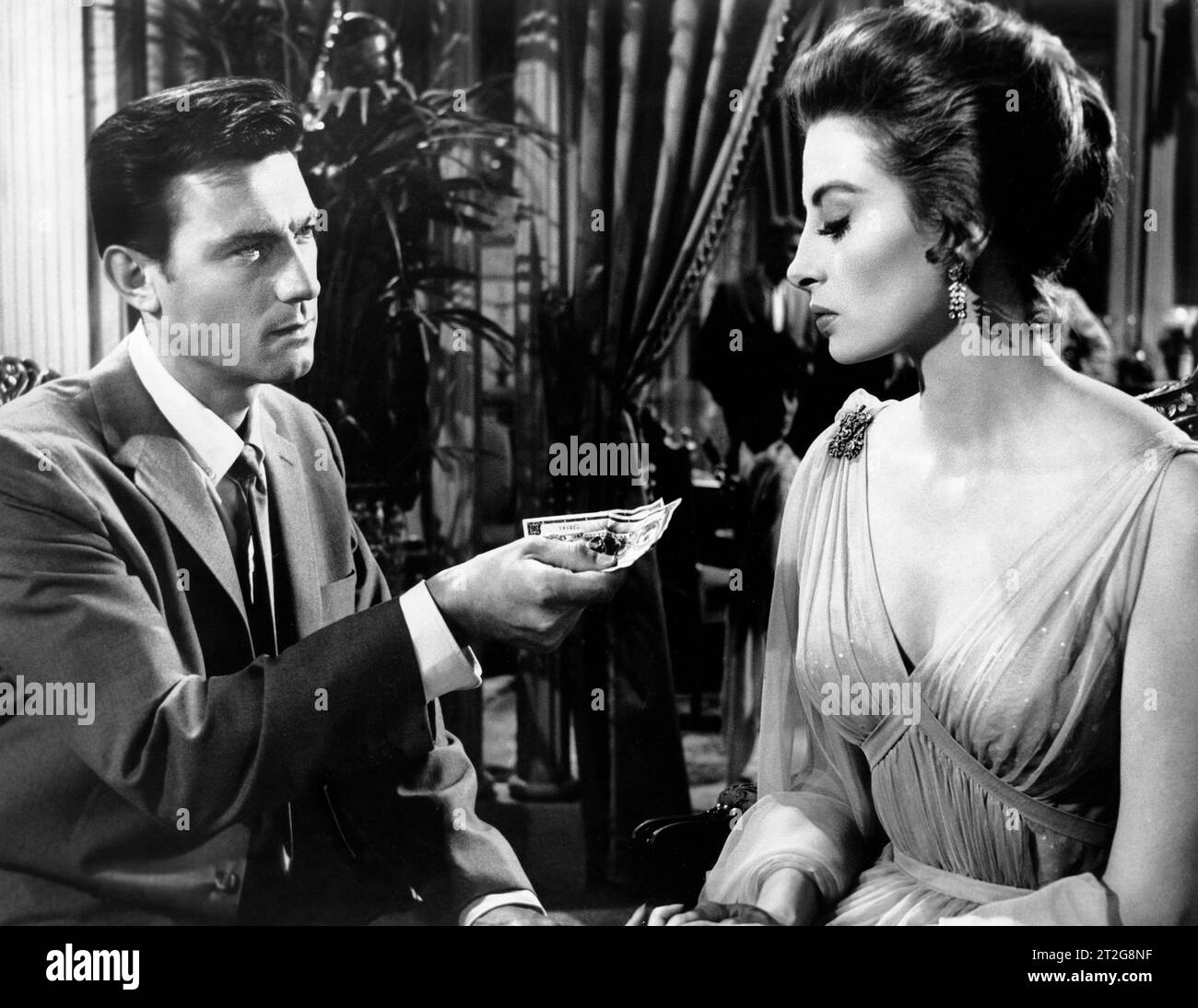 Laurence Harvey, Capucine, on-set of the film, 'Walk on the Wild Side', Columbia Pictures, 1962 Stock Photo