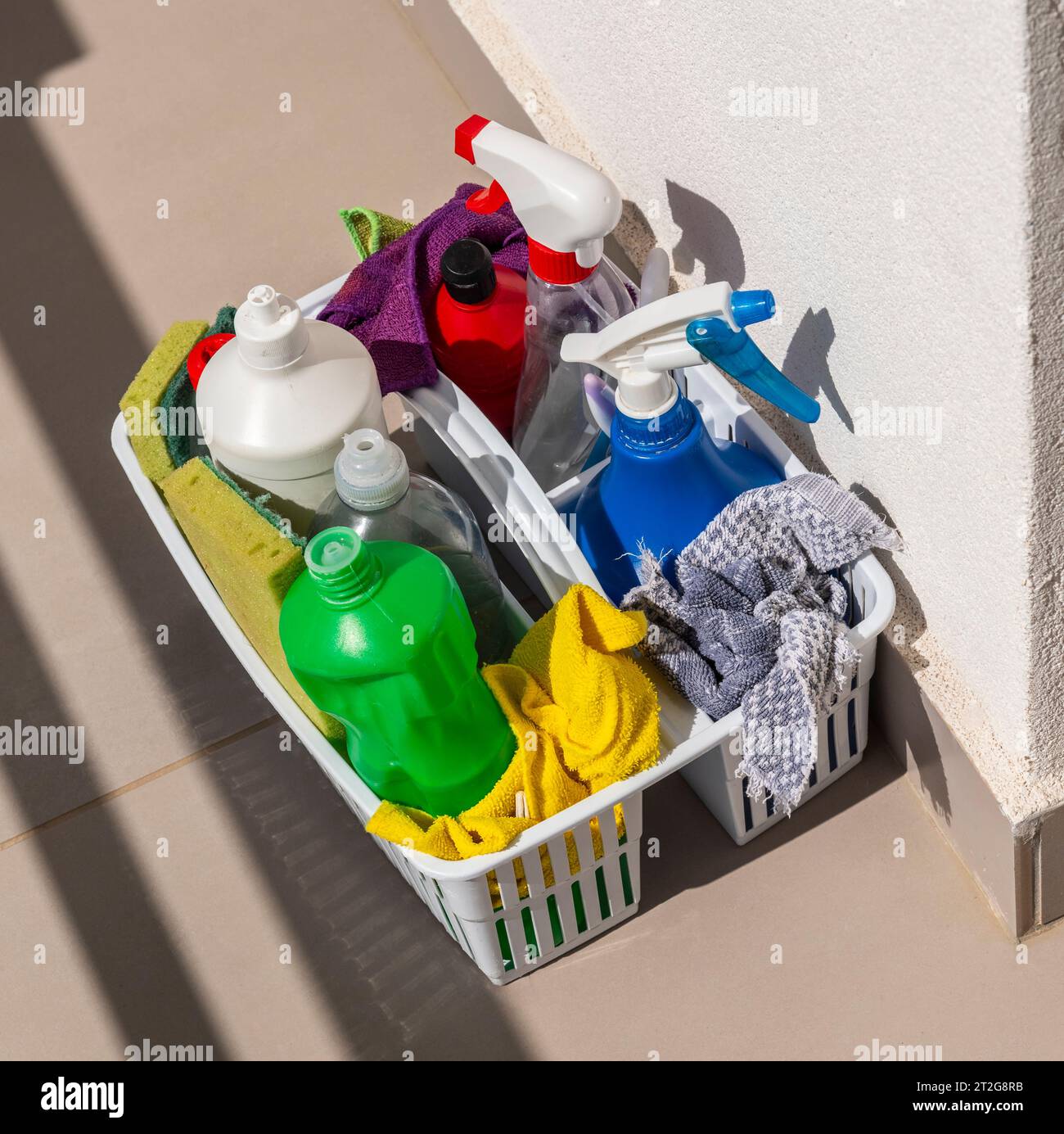 Greece, Europe.  01.10.2023.  Housekeeping equipment for cleaning hotel room. Plastic bottles, containers and cleaning clothes. Stock Photo