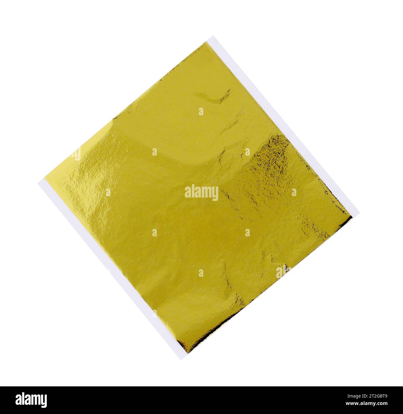 Edible gold leaf sheet isolated on white Stock Photo Alamy